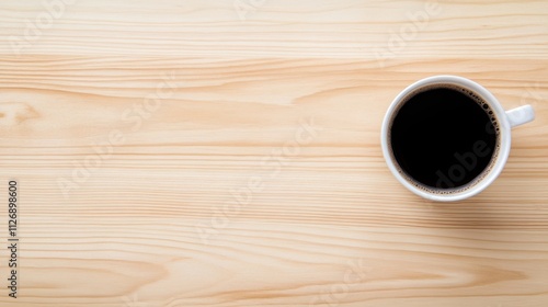 Black Coffee in a White Cup on Light Wooden Table Surface