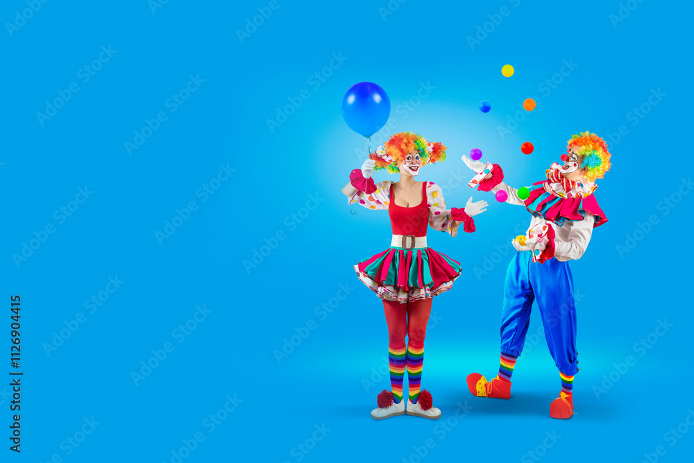 Funny juggler clown juggling balls in the circus, man entertainer as ...