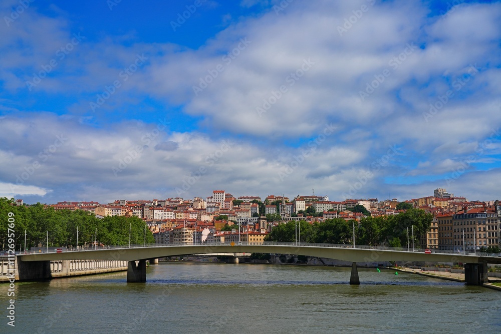 Obraz premium View of colorful buildings on the quay on the Saone River in downtown Lyon, France.