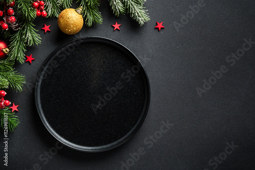 Christmas table. Christmas dinner holiday food with elegant decorations on black. Flat lay with copy space. photo