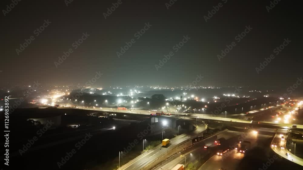 Nighttime Aerial View of Highway Interchange Nighttime Aerial View of Highway Interchange