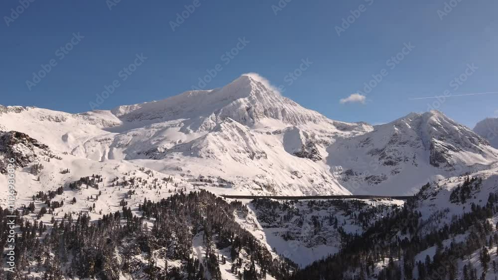 Alps. Mountains in Europe. Snow-covered mountains. A village in the Alps Alps. Mountains in Europe. Snow-covered mountains. A village in the Alps