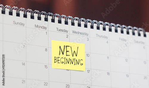 Today is a new beginning - motivational quote is shown using the text on calendar photo