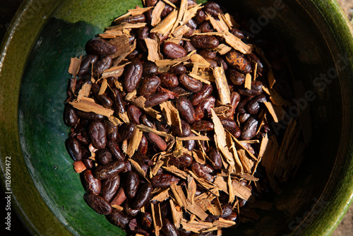 Organic cocoa beans from Oaxaca mixed with cinnamon. photo