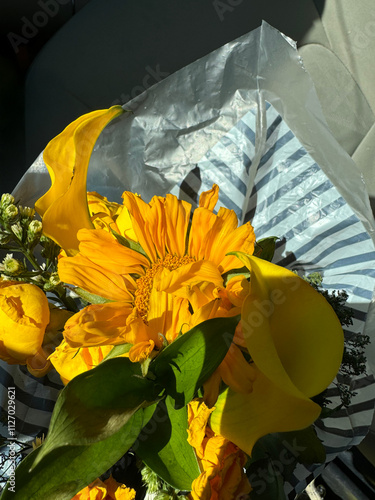 yellow flower in the car