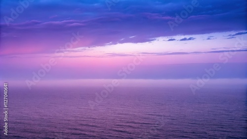 A serene and ethereal seascape with a hazy purple sky, where the ocean meets the horizon in a soft and dreamy embrace.