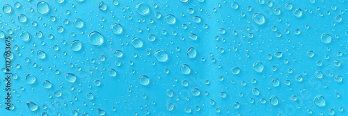 Wallpaper Mural Clear water droplets on vibrant blue background creating a refreshing and calming visual, pattern, detail, close-up Torontodigital.ca