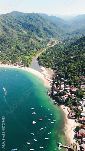 River flowing into crystal clear water beach in Yelapa, Mexico. South of Puerto Vallarta