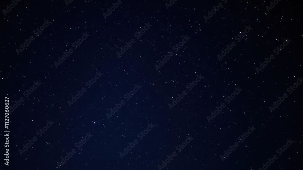 Fototapeta premium Dark night sky filled with sparkling stars against a black background, nature, cosmos