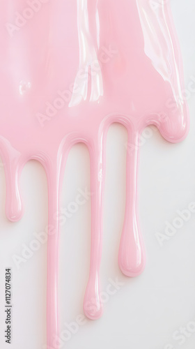 Pastel color pink paint or cream dripping from top on a white background