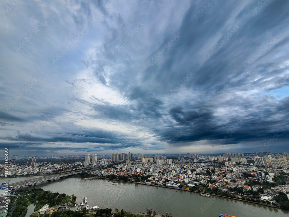A city with a large body of water in the background A city with a large body of water in the background