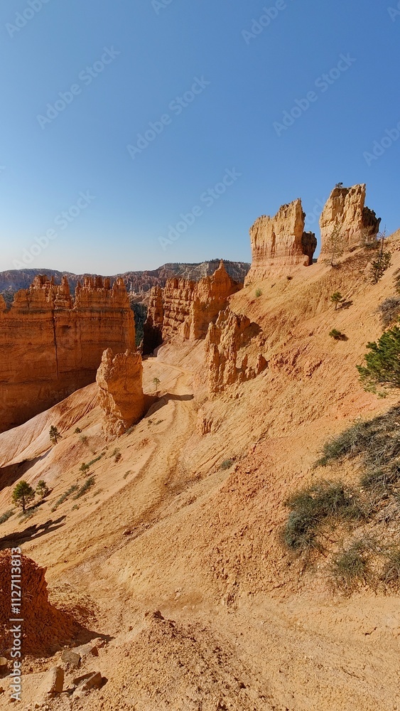 Fototapeta premium Hiking among the trippy rock and sand formations of Bryce Canyon National Park in Utah, USA