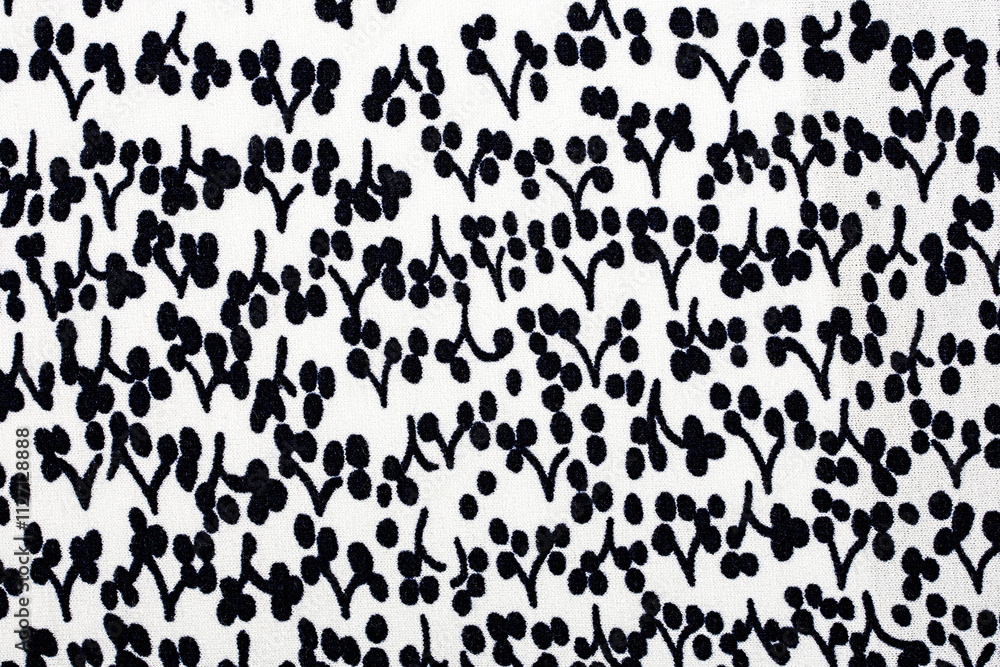 black and white fabric in abstract pattern a background or texture black and white fabric in abstract pattern a background or texture