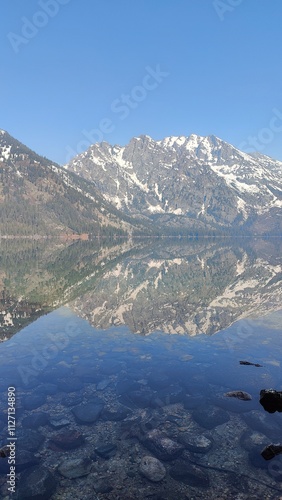 Hiking in the stunning mountain and lake scenery in the Grand Teton National Park, Wyoming photo