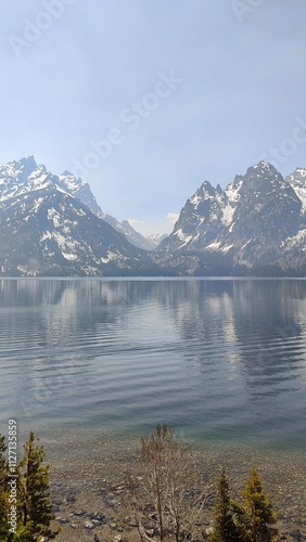 Hiking in the stunning mountain and lake scenery in the Grand Teton National Park, Wyoming photo