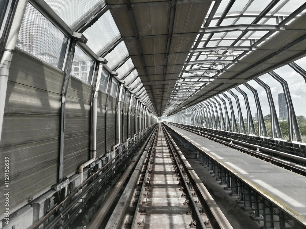 subway station leading line in black and white subway station leading line in black and white
