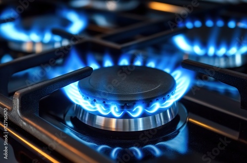 Close-up of blue flames from a gas stove