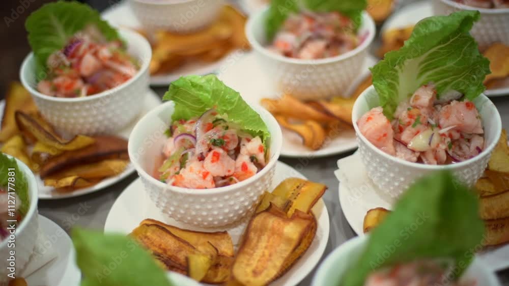 many white plates with ceviche at a holiday banquet many white plates with ceviche at a holiday banquet
