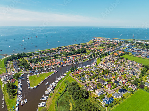 Aerial from the historical city Stavoren at the IJsselmeer in the Netherlands in summer photo