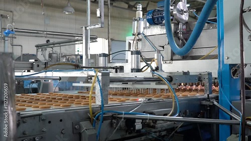 Industrial food factory or bakery, cookies on automated production line or conveyor belt, confectionery plant or bakehouse