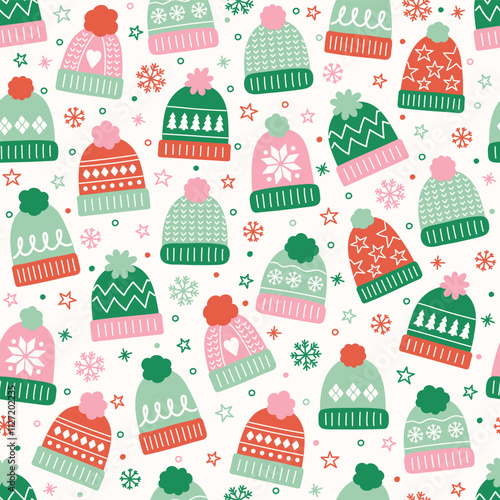 Colourful seamless pattern with cute hand drawn winter hats. Christmas background concept. Vector illustration