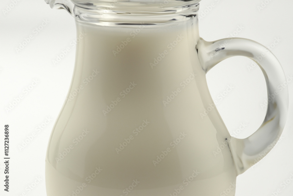 Jug of milk on white background. Jug of milk with gray background. Jug of milk with a transparent background and a glass. A glass jug with a transparent background lifestyle of milk. Jug of milk on white background. Jug of milk with gray background. Jug of milk with a transparent background and a glass. A glass jug with a transparent background lifestyle of milk.