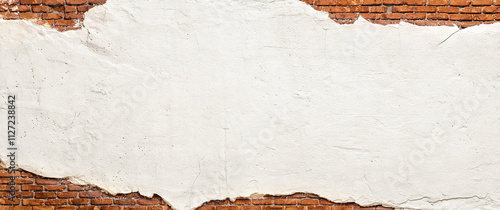 brick wall under cracked pl...