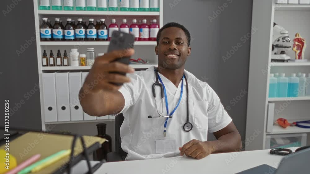 Young man in a clinic taking a selfie, showcasing a cheerful and professional atmosphere with medical supplies in the background. Young man in a clinic taking a selfie, showcasing a cheerful and professional atmosphere with medical supplies in the background.