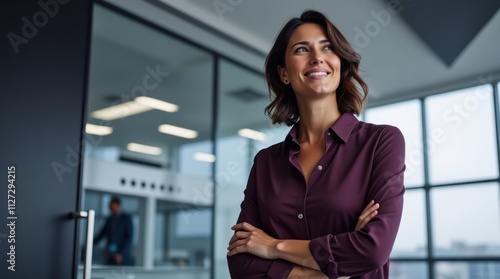 Confident Professional Woman in Modern Office Setting With Arms Crossed Free Download Confident Professional Woman in Modern Office Setting With Arms Crossed - GFXLoad