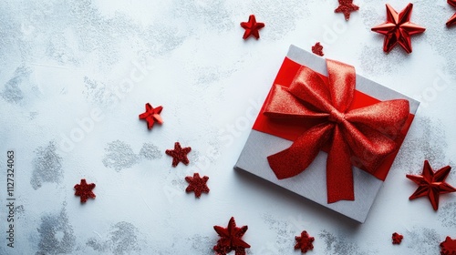 Wallpaper Mural Gift box with red bow and decorative stars on a textured white background for festive celebrations and holidays concept. Torontodigital.ca