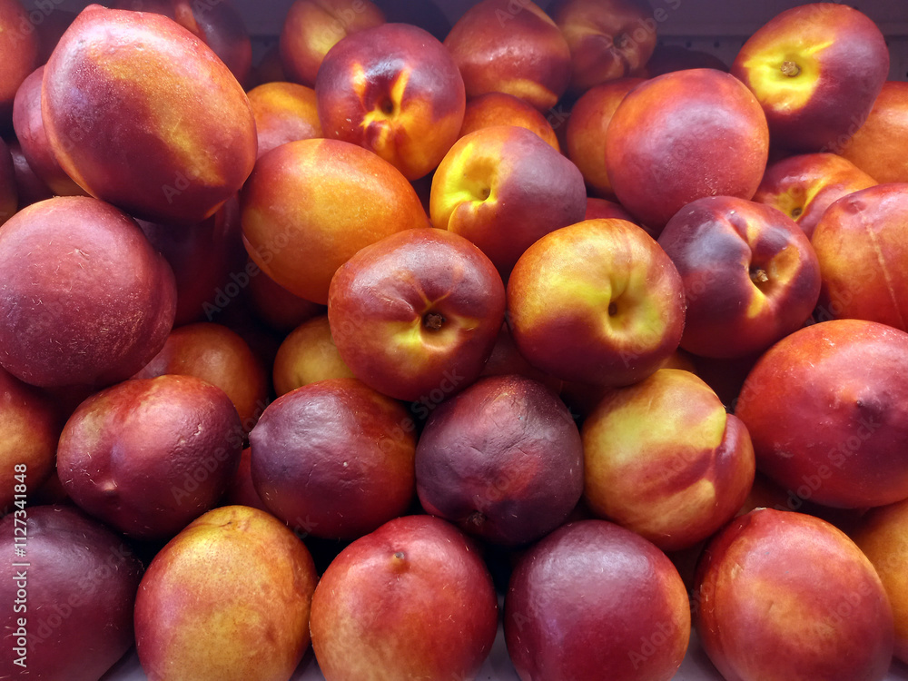 LOTS OF NECTARINES IN THE SUPERMARKET LOTS OF NECTARINES IN THE SUPERMARKET
