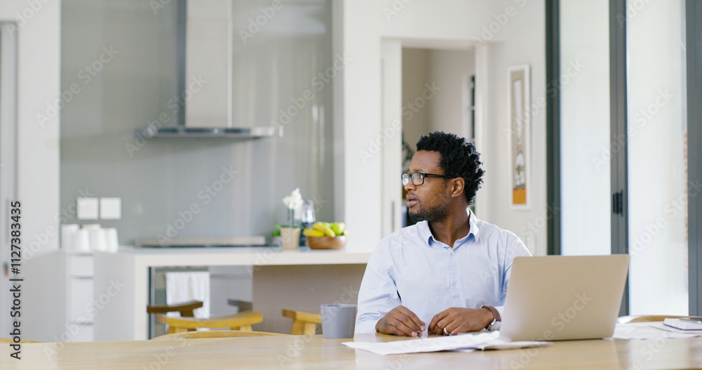 Remote work, confused and black man with laptop, home and unsure of financial report, thinking and kitchen. House, contemplating and auditor with doubt for records, wondering and professional Remote work, confused and black man with laptop, home and unsure of financial report, thinking and kitchen. House, contemplating and auditor with doubt for records, wondering and professional