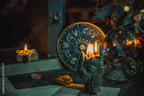 Rite with a burning candle, night mystery atmosphere, Christmas eve, Yule or another day