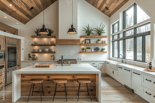 Modern farmhouse kitchen with white cabinets, wood accents, large island, and expansive windows.