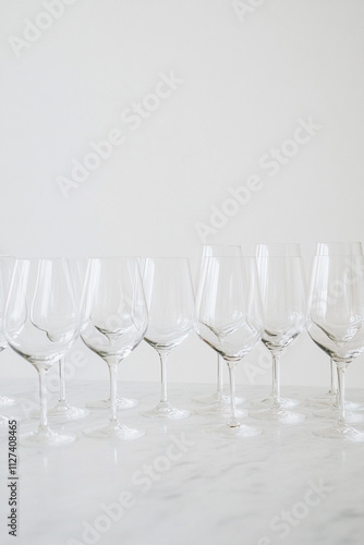 Dry January, Minimalist design for Dry January with empty wine glasses and simple candle decor. Clean, serene environment emphasizes sober, healthy lifestyle,