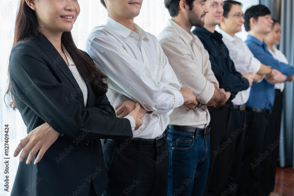 Business team standing, join and link hand together in line symbolize successful business partnership and professional synergy with diverse culture group people cooperation. Prudent Business team standing, join and link hand together in line symbolize successful business partnership and professional synergy with diverse culture group people cooperation. Prudent