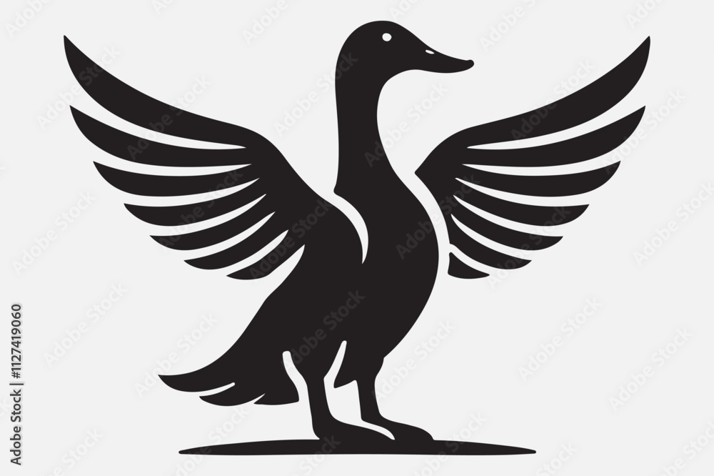 Fototapeta premium A duck standing upright with its wings spread open.