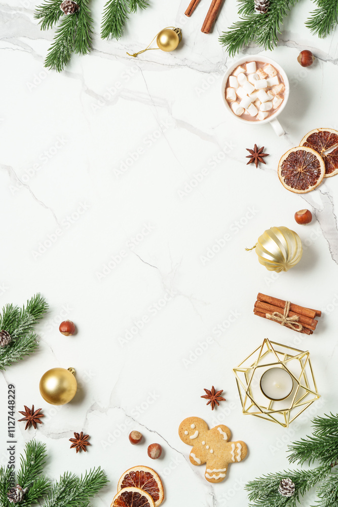 Christmas flat lay background at white. Gingerbread cookies with hot chocolate, spices, spruce tree and christmas decorations. Christmas flat lay background at white. Gingerbread cookies with hot chocolate, spices, spruce tree and christmas decorations.