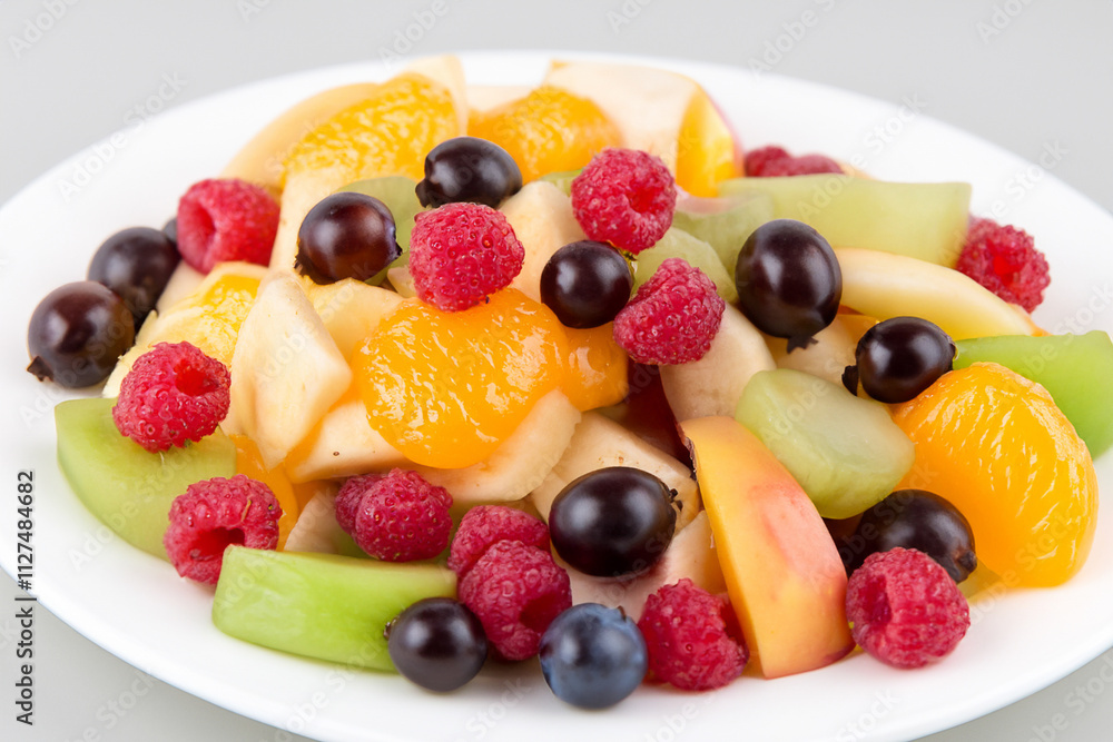 Of fruit salad with raspberries, blueberries, and strawberries. Of fruit and white salad. A plate of sliced fruit salad lies on a white plate. A plate of sliced fruit salad lies on a white lifestyle. Of fruit salad with raspberries, blueberries, and strawberries. Of fruit and white salad. A plate of sliced fruit salad lies on a white plate. A plate of sliced fruit salad lies on a white lifestyle.