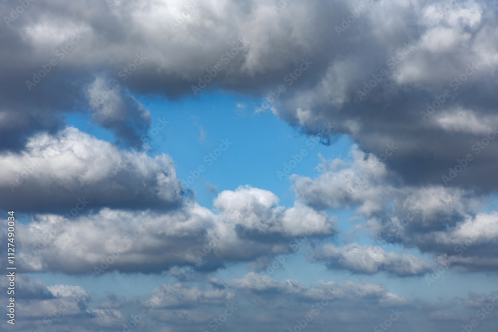 Fototapeta premium A cloudy and stormy sky on an early spring morning