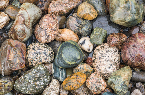 Colorful rocks along the stream bank in Rio de Janeiro photo