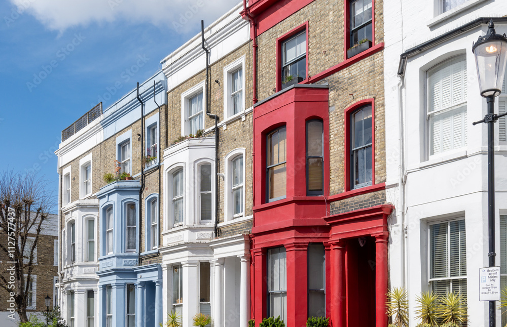 Obraz premium Touristic route on Notting Hill, walking on streets with colourful houses, Portobello road, city life, wealthy neighbourhoods in London, UK