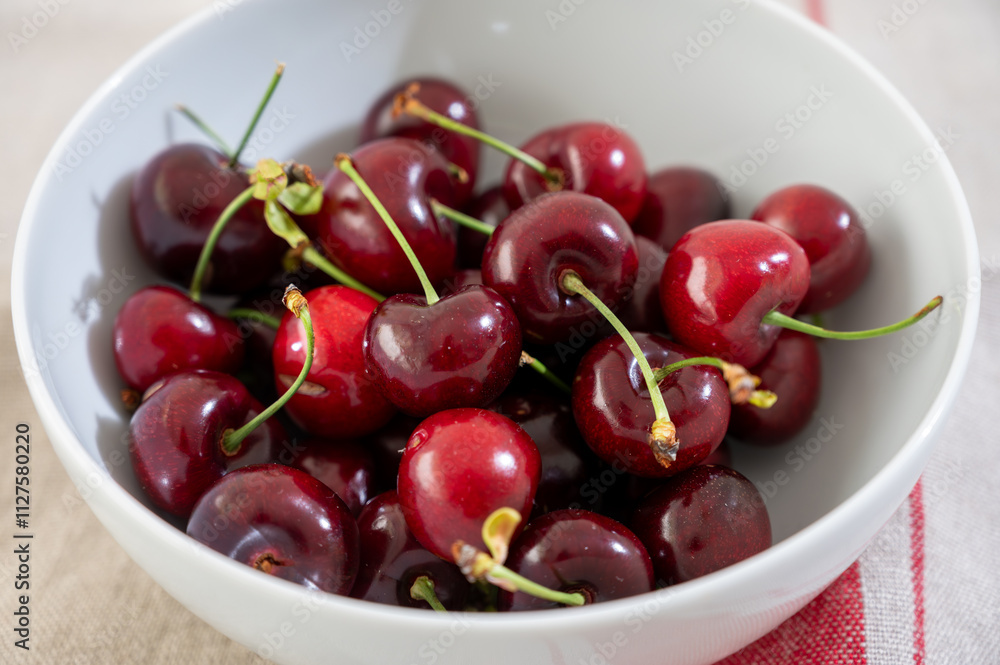 New harvest of fresh ripe dark red cherry berry in Provence, France close up New harvest of fresh ripe dark red cherry berry in Provence, France close up