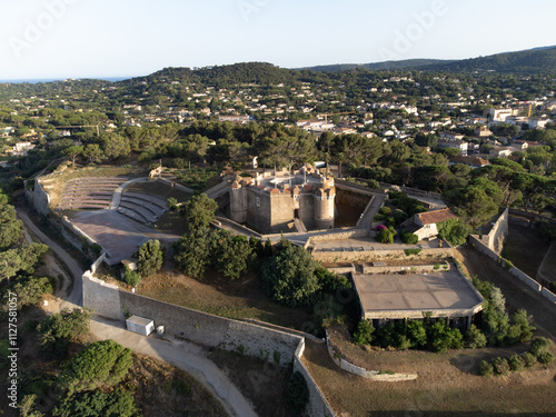 Aerial view on bay, hills,, old citadel fort, olorful houses of famous Saint-Tropez town on French Riviera, Var, Provence, France, summer vacation destination photo