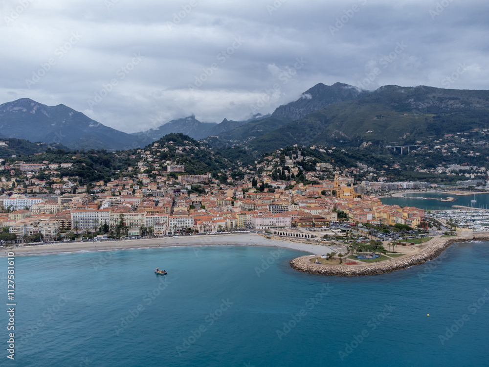 Fototapeta premium Aerial view on French Riviera, colorful Menton old city and marina on Mediterranean Sea near French-Italian border, travel destination, panoramic view from above