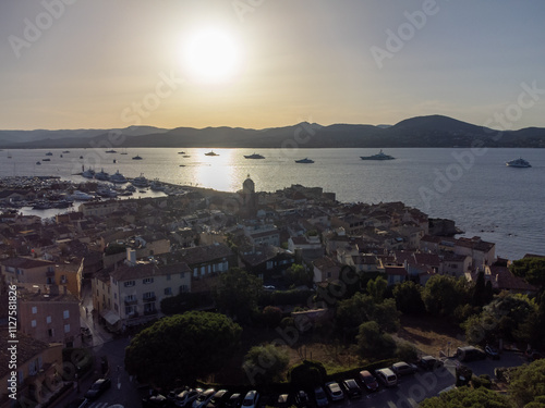 Aerial view on bay, hills,, old citadel fort, olorful houses of famous Saint-Tropez town on French Riviera, Var, Provence, France, summer vacation destination photo