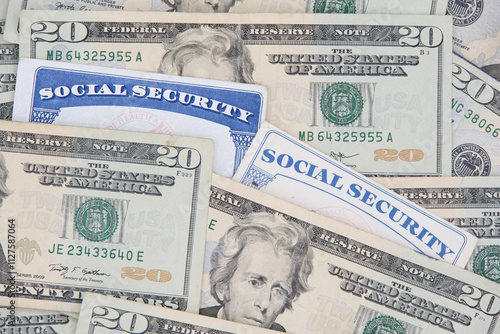 New and Old style Social Security cards with 20 dollar bills. SS number is a nine digit number issued to U.S. Citizens and is required to legally be employed in the United States
 photo