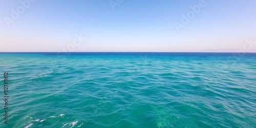 Azure sea stretching to the horizon under a clear Aegean sky, summer, aqua