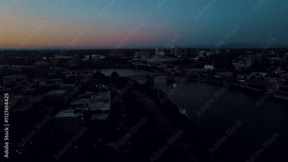Aerial landscape of Central downtown Portland Willamette river city skyline summer night Oregon Aerial landscape of Central downtown Portland Willamette river city skyline summer night Oregon