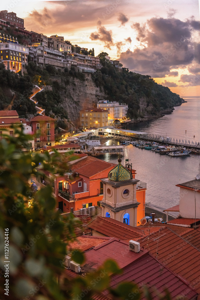 Fototapeta premium Italy, Sorrento. View from the high shore of the sea and the surrounding area of Sorrento in the evening